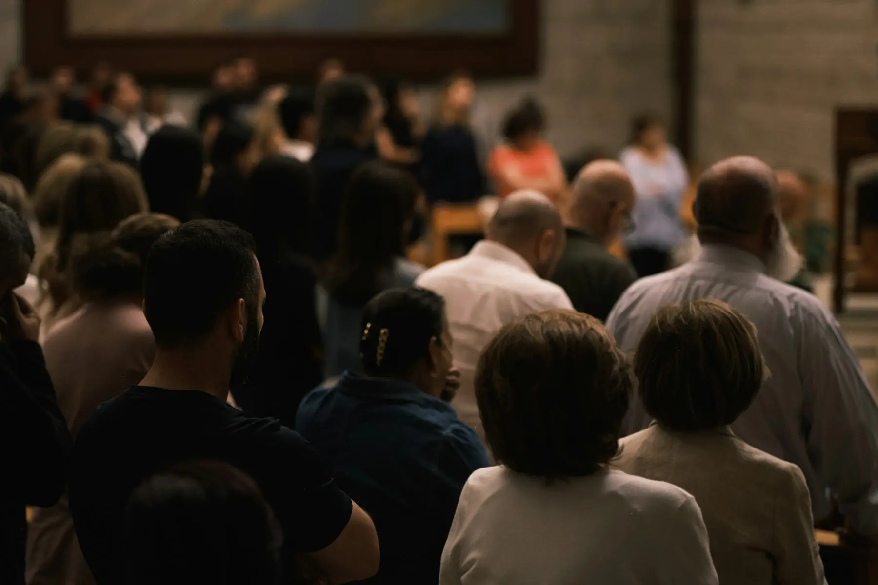 A congregation seen from behind during a Sunday gathering