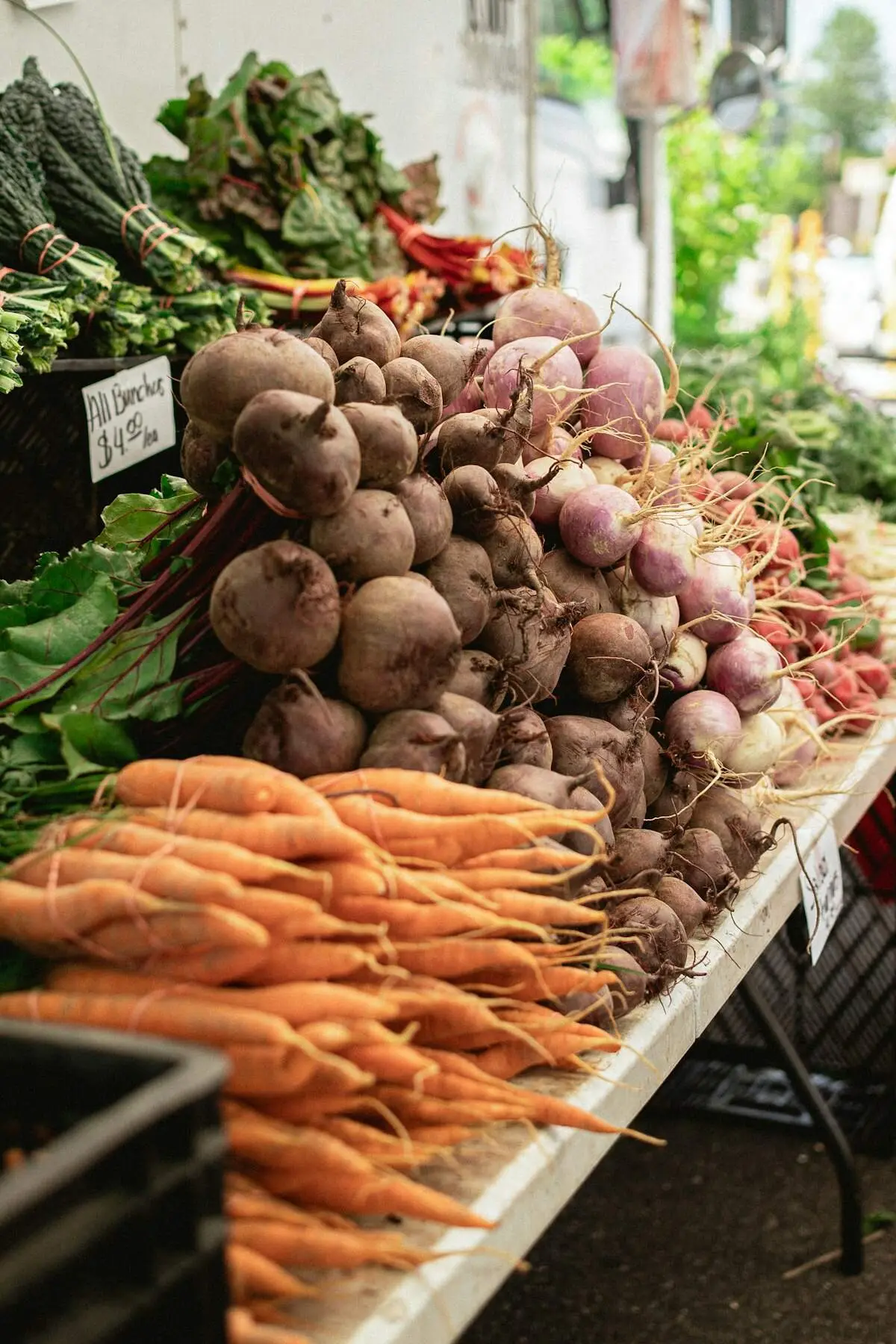 Carrots and beets on a market table