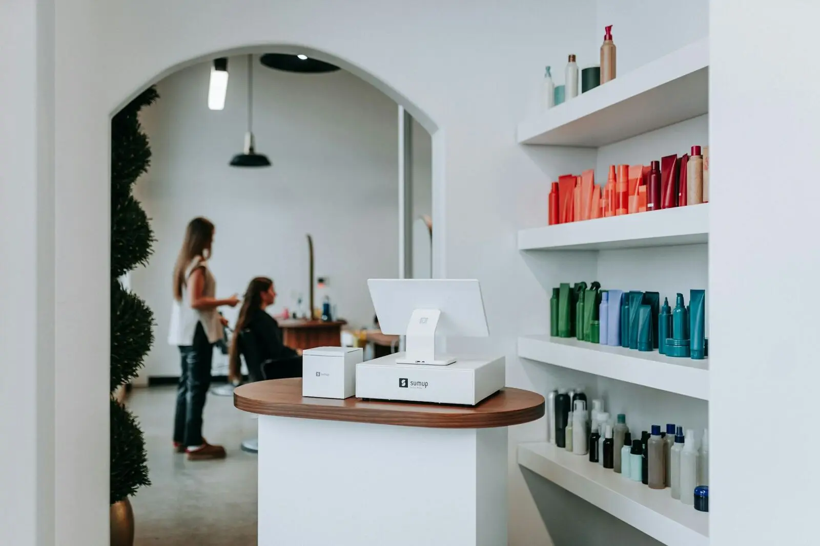 A salon interior with chairs and products